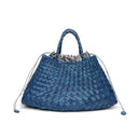 Blue woven drawstring bag on a white background